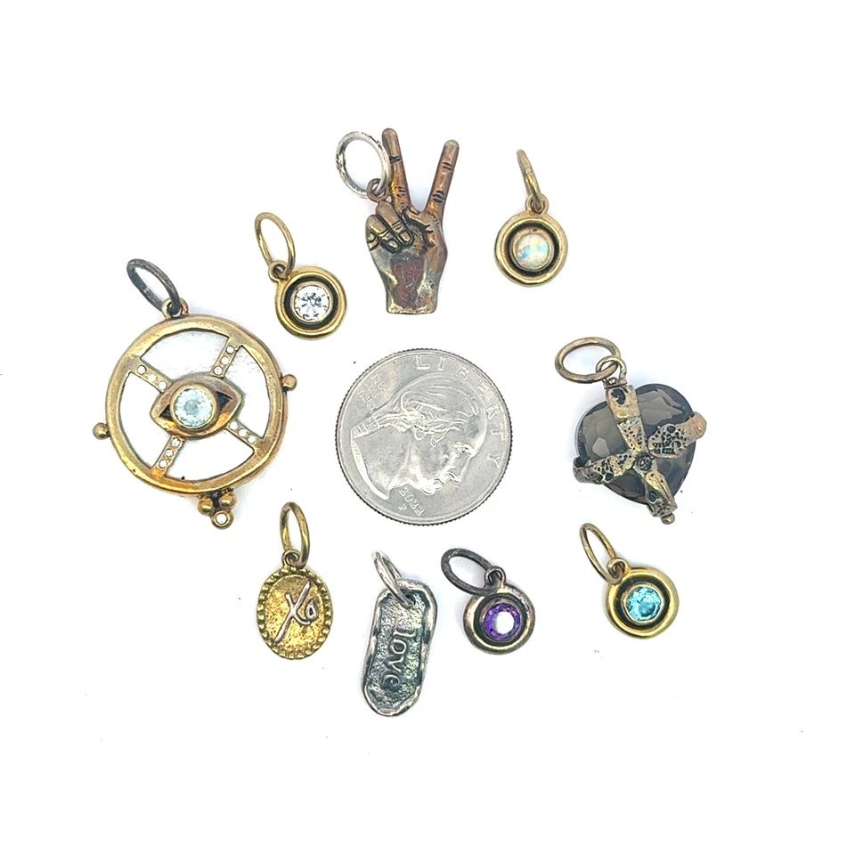 Waxing Poetic lot of 9 new silver pendants -- lot 27 - Image 1 of 1