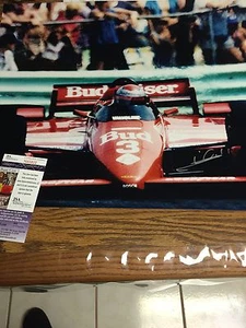 AUTOGRAPHED MARIO ANDRETTI 16-20 PHOTO FRONT VIEW SHOT JSA CERTIFIED SIGNED - Picture 1 of 4
