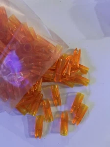 50 VINTAGE FLO ORANGE 9/32” ORIGINAL AAE PLASTINOCK GLUE ON SNAP ARROW NOCKS - Picture 1 of 1