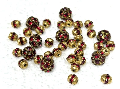 38 Vintage Red Rhinestone Studded Beads in Gold Tone Metal 3/8-1/4 Inch - Image 1 of 3