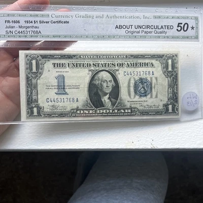 1934 $1 Funnyback Silver Certificate About Uncirculated Note - Image 1 of 4