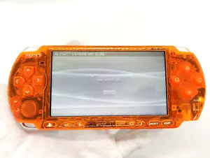 Consola portátil Sony PSP-3000 Playstation carcasa naranja transparente personalizada - Imagen 1 de 12