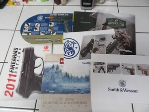 Lot of 8 Firearm Catalogs & one backing sheet, S&W, Ruger, Remington - Picture 1 of 7