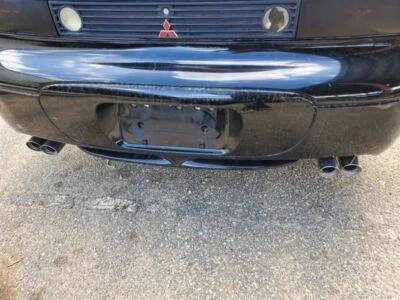 Rear Bumper Black Has Scratches OEM 1999 Mitsubishi 3000GT - Image 1 of 4