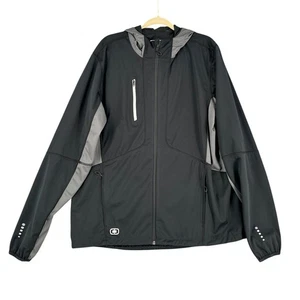 Chaqueta cortavientos OGIO negra gris con capucha cierre de cremallera bolsillo logotipo extra grande - Imagen 1 de 6