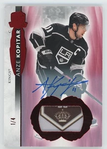 2021-22 Upper Deck The Cup étiquette feuille rouge autographe Anze Kopitar 1/4 - Photo 1 sur 3