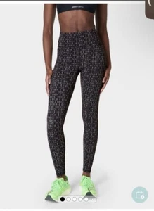 Brandneu mit Etikett Sweaty Betty Zero Gravity Run Leggings £95 7/8 XS schwarz Kreis Blockdruck - Bild 1 von 6