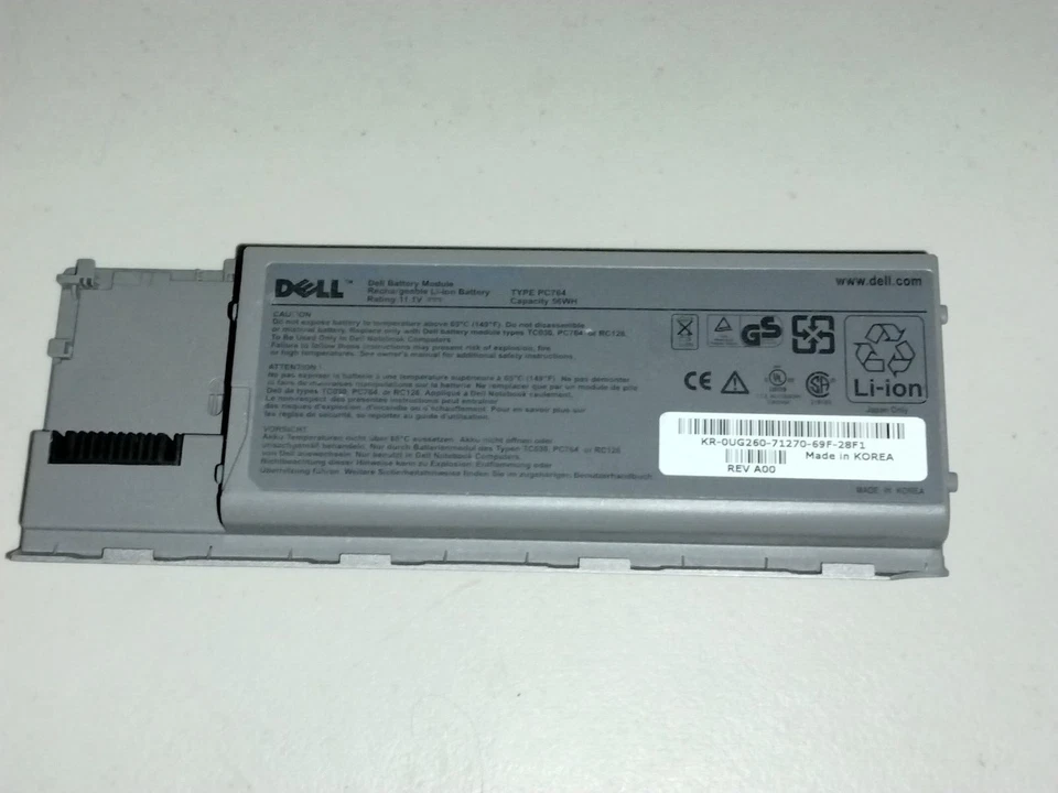 Batería genuina para computadora portátil Dell OEM D620 D630 D630N OEM PC764 astillada Foto 1 de 4