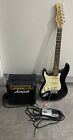 Left handed electric guitar and Marshall MG10CD Amp
