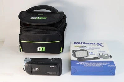 Sony Handycam HDR-CX405 Camcorder, Set w/LED Light, Tripod, Carrying Case   - Image 1 of 4