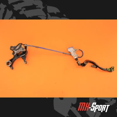 12-18 2012 KX450F KX 450F OEM Pinza de freno trasera Soporte Conjunto de pedal Foto 1 de 4