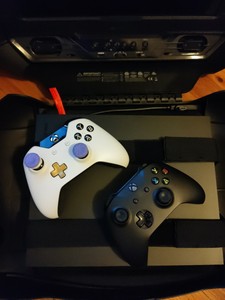 Xbox One X console with 2 controllers , 2 Video Games, GAEMS G155 Sentry 