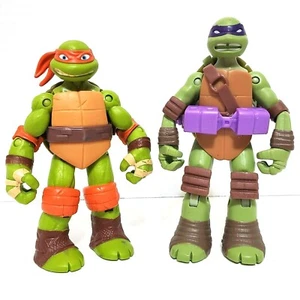 Juguetes Teenage Mutant Ninja Turtles TMNT Playmates Michelangelo Donatello - Imagen 1 de 8