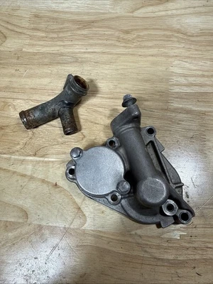 Cubierta del filtro de aceite de la bomba de agua Suzuki RMZ 250 2004 2005 2006 2004 2005 KXF 250 Foto 1 de 2