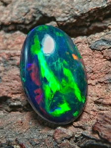 Echter natürlicher Multi Feueropal 4,40 ct Ovalschliff seltener schwarzer Opal Edelsteinherstellung - Bild 1 von 10