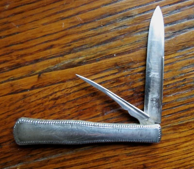 ANTIQUE STERLING SILVER FRUIT KNIFE with NUT PICK & DECORATED BACK SPRING - Image 1 of 4