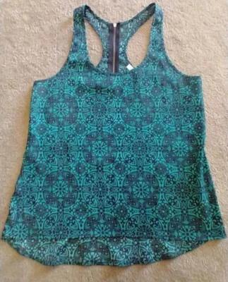  Blusa sin mangas verde con cremallera trasera ambiente M elegante oficina formal  Foto 1 de 4