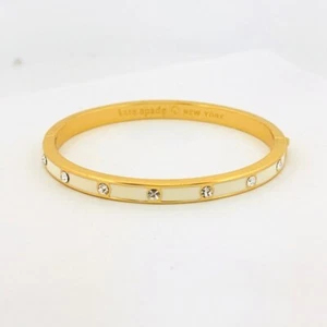 Kate Spade Gold Tone White Enamel Crystal Hinged Bangle Bracelet 6.67" 20.6g - Picture 1 of 7
