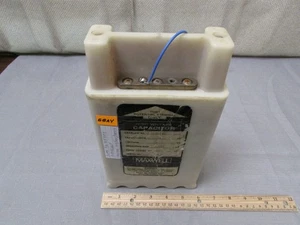 Maxwell/General Atomics Cat: 31199 .04 uF 50 kV High Voltage Capacitor s/n25204 - Picture 1 of 3