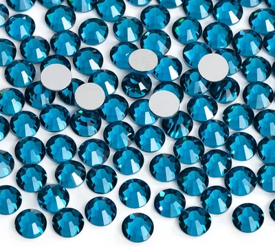 Gemas de diamantes de imitación de cristal con respaldo plano de fijación de pegamento para manualidades arte en uñas Foto 1 de 4