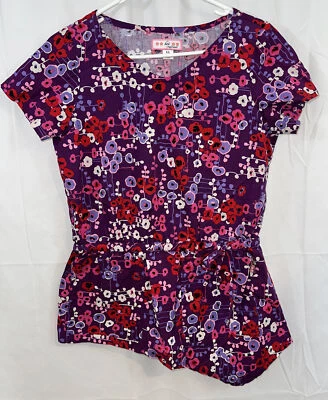 Blusa Médica Koi Para Mujer XS Púrpura Rosa Floral Dobladillo Asimétrico #156PR Foto 1 de 4