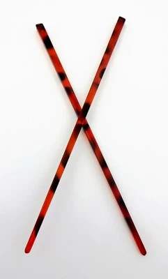 Juego de dos palillos de plástico con diseño de tortuga Foto 1 de 4