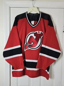 Vintage CCM Maska New Jersey Devils Rot Trikot Herren Größe Large Genäht  - Bild 1 von 4