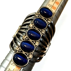 OLD STORE STOCK RING SILVER TONE STRETCH BLUE STONES S1ZE 8 - Picture 1 of 2