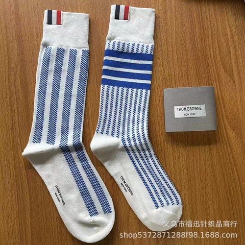 Calze Thom Browne a righe medie alte da donna