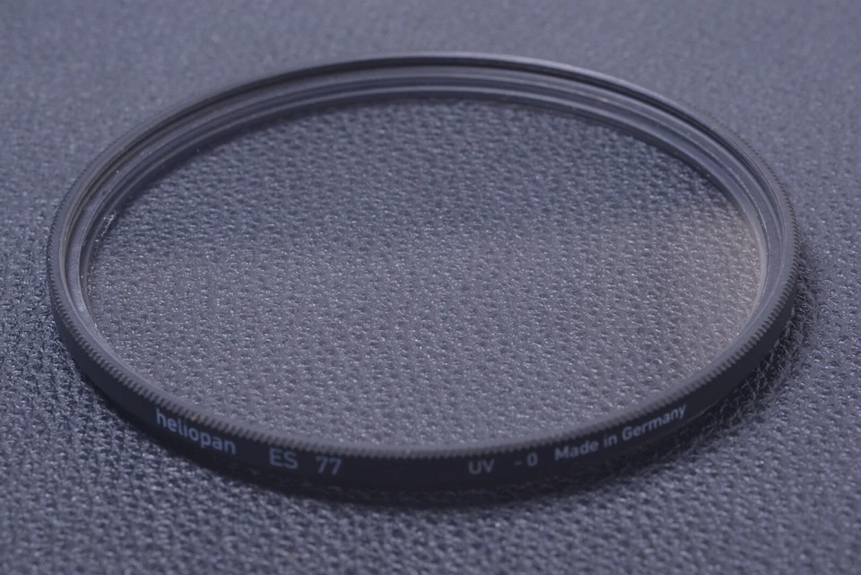 ✅ HELIOPAN UV -0 77MM FILTER GENUINE LENS OR CAMERA SCREW IN   13-4 - Image 1 of 1