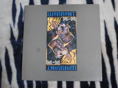 Warrant ‎– Dog Eat Dog Columbia ‎– COL 472033 1 LP (NM/EX+) Foto 1 de 4