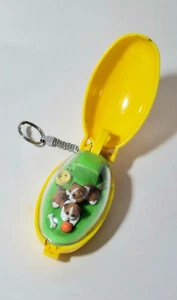 Portachiavi Takara Pocket Critters cucciolo amici vintage giallo 1993 - Foto 1 di 4