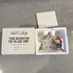 Department 56 Snow Village Kids Decorating the Village Sign 5134-9 Dept. 56  - Picture 1 of 4