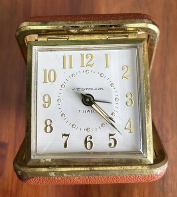 VINTAGE WESTCLOX TRAVEL ALARM CLOCK, FOLDS, PEBBLED COVER - Image 1 of 4
