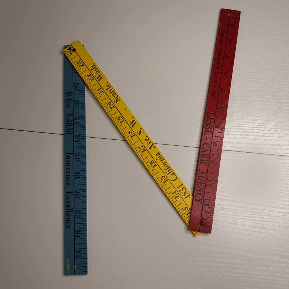 Memorabilia publicitaria de palo de patio de regla plegable vintage Foto 1 de 3