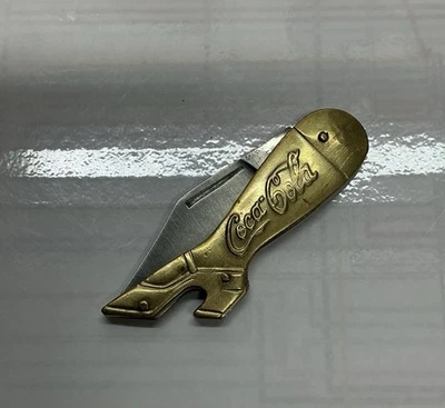 Cuchillo VALOR Hecho en Japón DAMAS PIERNA COCA COLA COKE Publicidad LATÓN Mango Foto 1 de 4