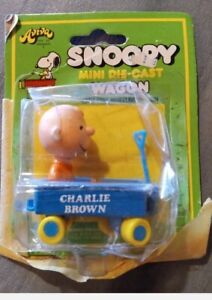 Vintage Charlie Brown peanuts Charlie Brown in wagon diecast