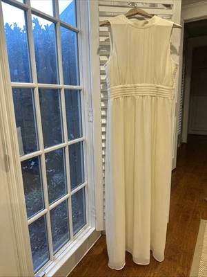 Vestido largo grande marfil sin mangas para mujer Foto 1 de 4