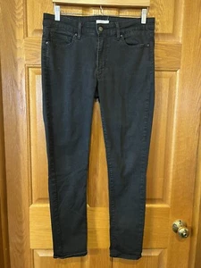 CJ19 Levis 711 vaqueros ajustados negros de altura media para mujer 31 - Imagen 1 de 4