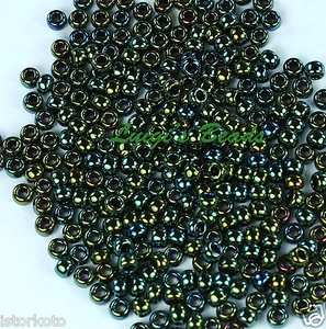 Cuentas redondas de semillas de vidrio TOHO Japón 8/0 #84- iris metálico/verde marrón 10 gramos - Imagen 1 de 2