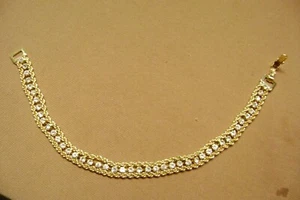 SPARKLE PRONG SET CLEAR RHINESTONE TWISTED CHAIN GOLD TONE 7" TENNIS BRACELET - Picture 1 of 6