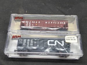 2 Atlas N Scale 90 Ton Hoppers: Canadian National 32855 & Western Maryland 32665 - Picture 1 of 4