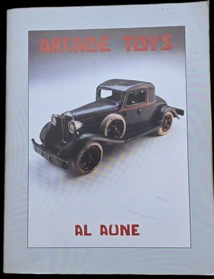 Libro de juguetes arcade firmado por Al Aune 1990 de colección de hierro fundido guía de coleccionista buen estado Foto 1 de 4