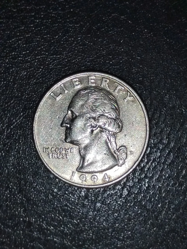 Moneda de cuarto de error 1994 en COD en la que confiamos Foto 1 de 4