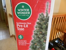 6 foot green prelit Christmas tree w/200 clear lights