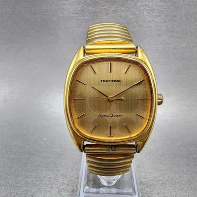 Reloj Technos Extra Cuarzo Hombre 33mm Esfera Dorada Tono Dorado Rectángulo Batería Nueva Foto 1 de 4