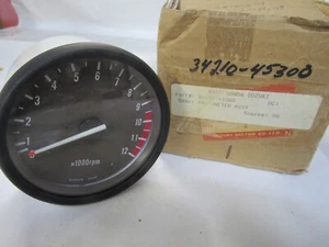Suzuki GS400 NOS TACHOMETER ASSY 34210-45300 GS450L GS550L GS1000GL GS750L - Picture 1 of 2