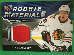 LUCAS CARLSSON Rookie Materials Red 2020-21 UD Ser 2 Hky #RM-LC 1:56 Hawks - Picture 1 of 2