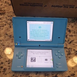 Consola portátil Nintendo DSi azul claro sistema de juegos - Imagen 1 de 5