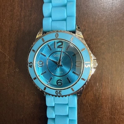 Reloj de cuarzo Gossip tono plata esfera aguamarina azul correa de silicona, funciona muy bien Foto 1 de 4